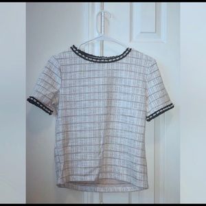 Sophisticated gamine-like top